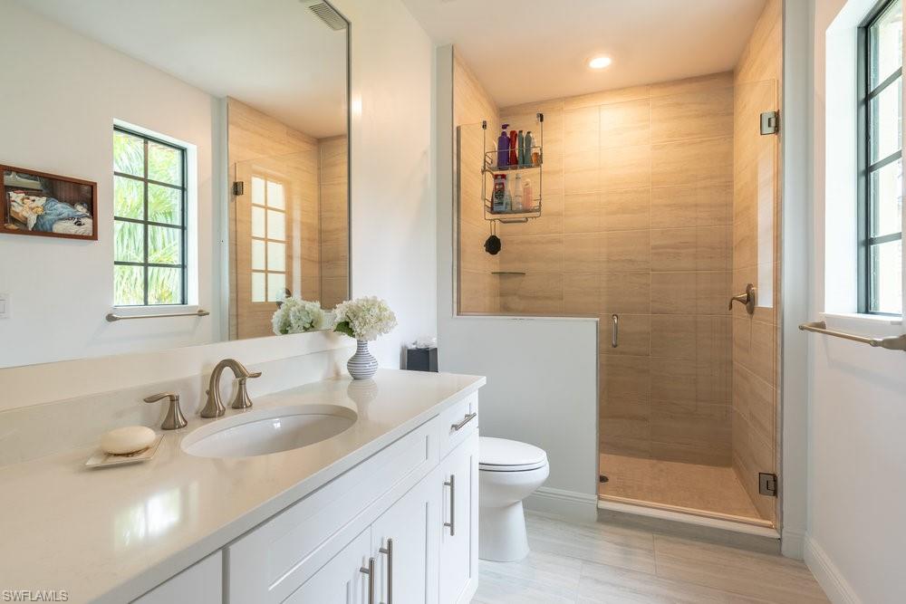 16347 Viansa Way, Unit 102 Naples, FL 34110 - Photo 20 of 40 3rd Bedroom full ensuite Bathroom with shower