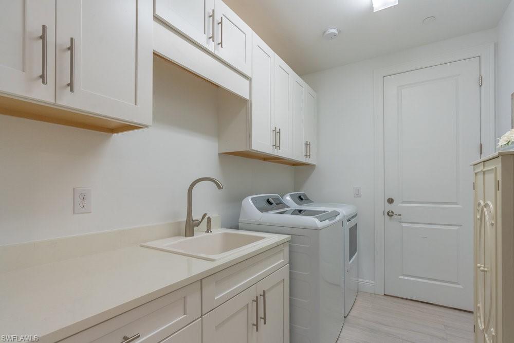 16347 Viansa Way, Unit 102 Naples, FL 34110 - Photo 21 of 40 Laundry Room with utility tub