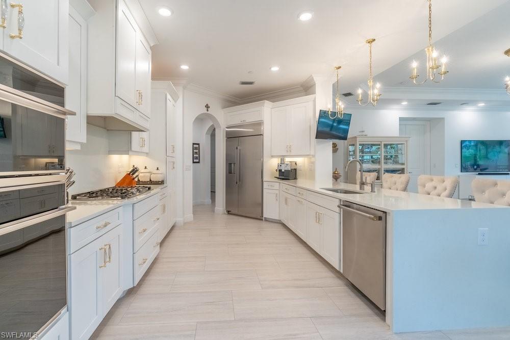 16347 Viansa Way, Unit 102 Naples, FL 34110 - Photo 9 of 40 Kitchen Gas Cooking