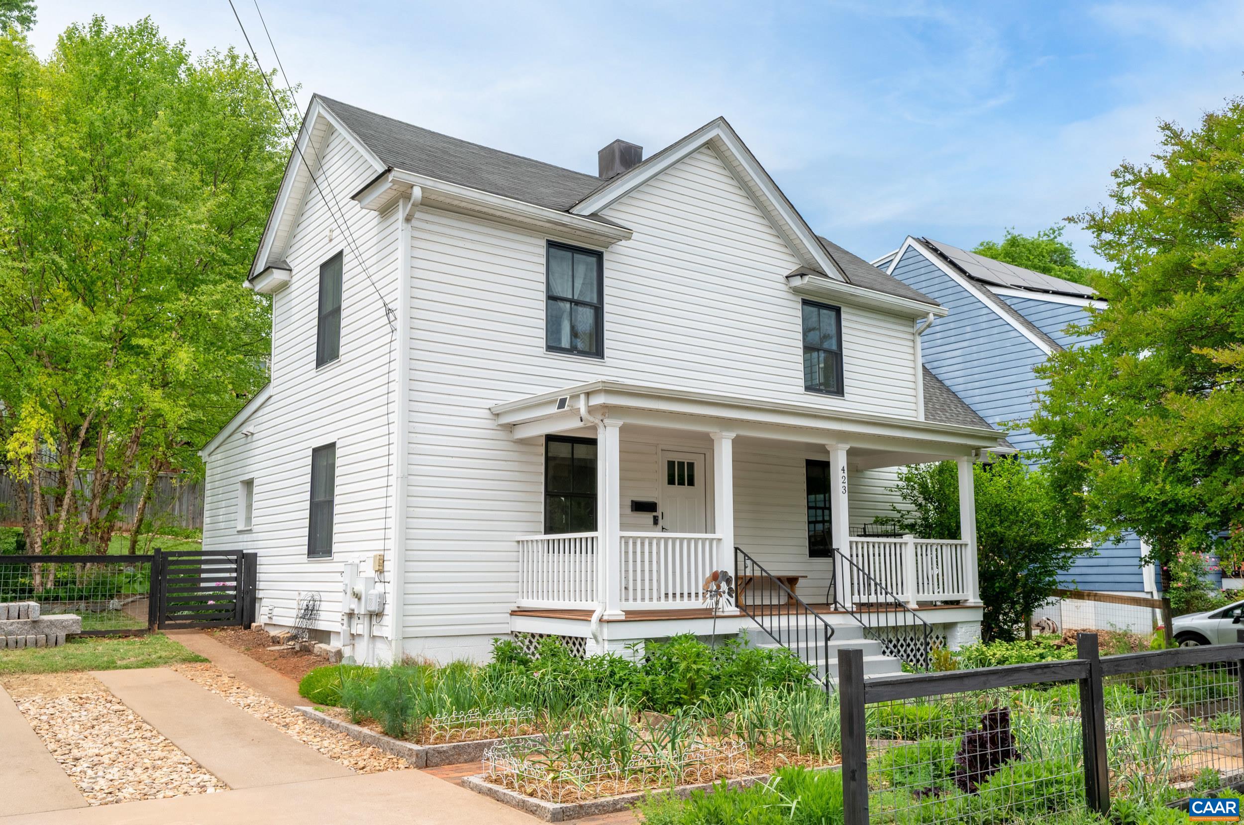 423 Meade Avenue Charlottesville, VA 22902 - Photo 1 of 47 a front view of a house with a yard and porch