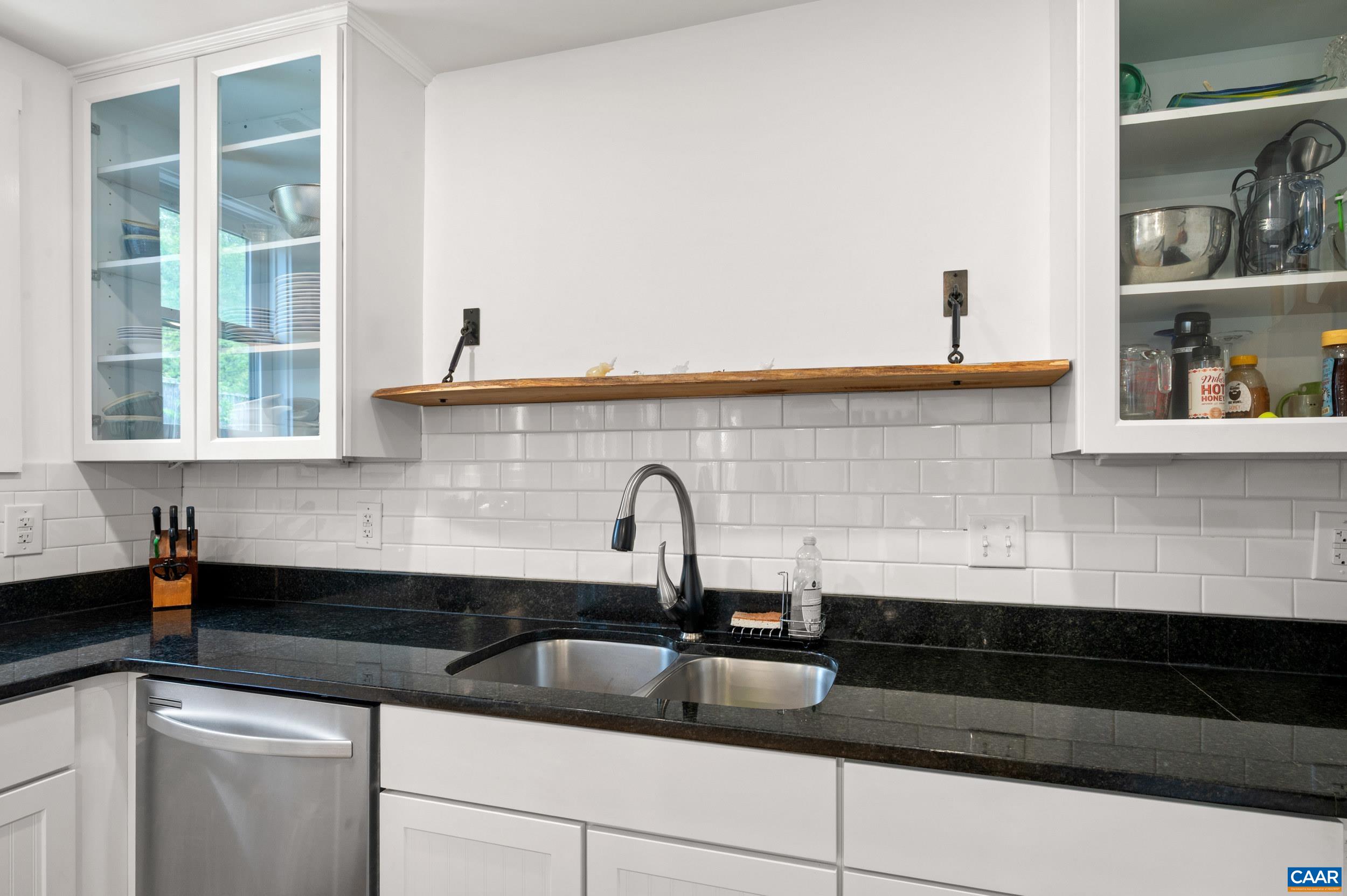 423 Meade Avenue Charlottesville, VA 22902 - Photo 13 of 47 a kitchen with a sink and cabinets