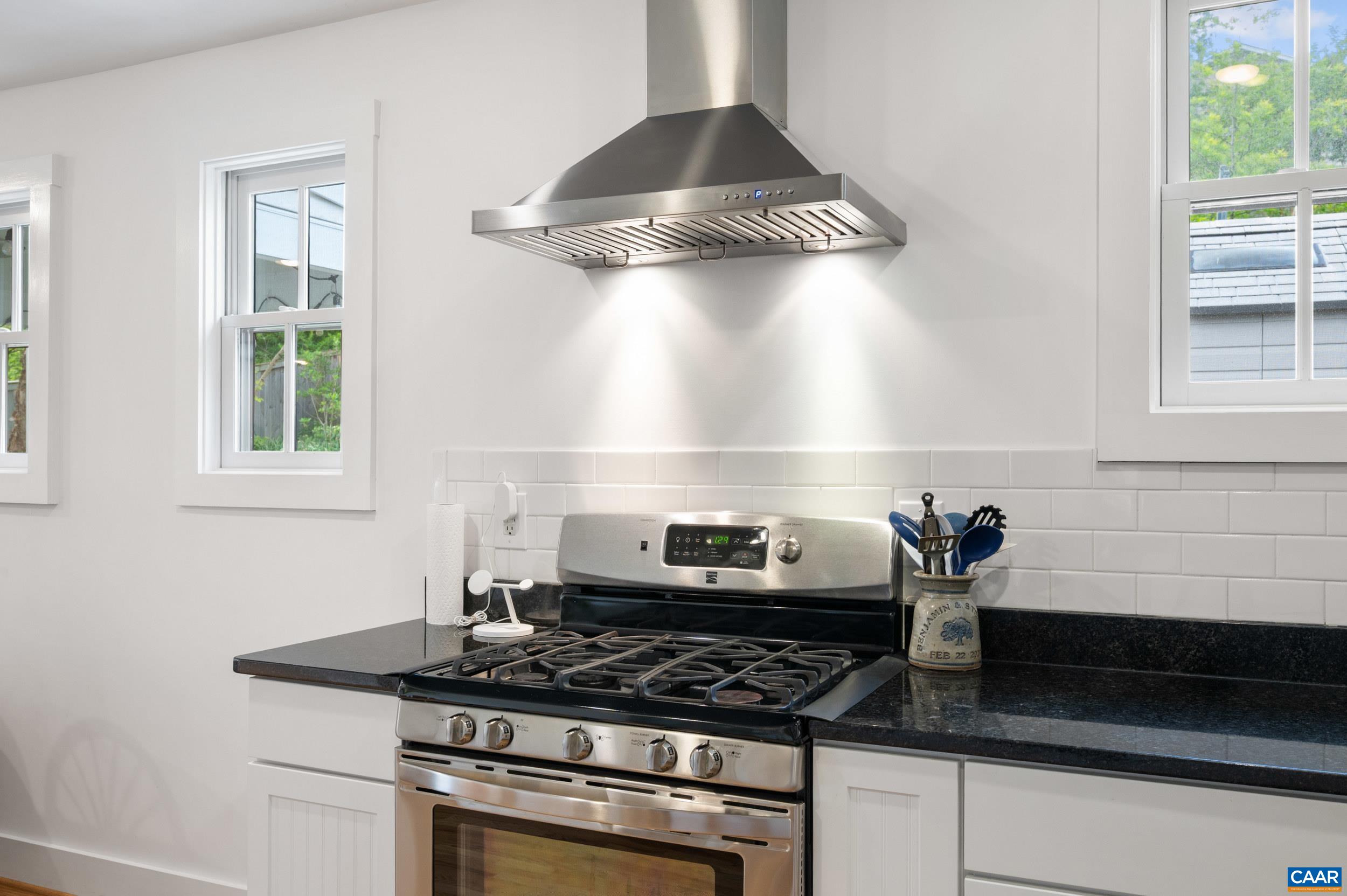423 Meade Avenue Charlottesville, VA 22902 - Photo 14 of 47 a stove top oven sitting inside of a kitchen