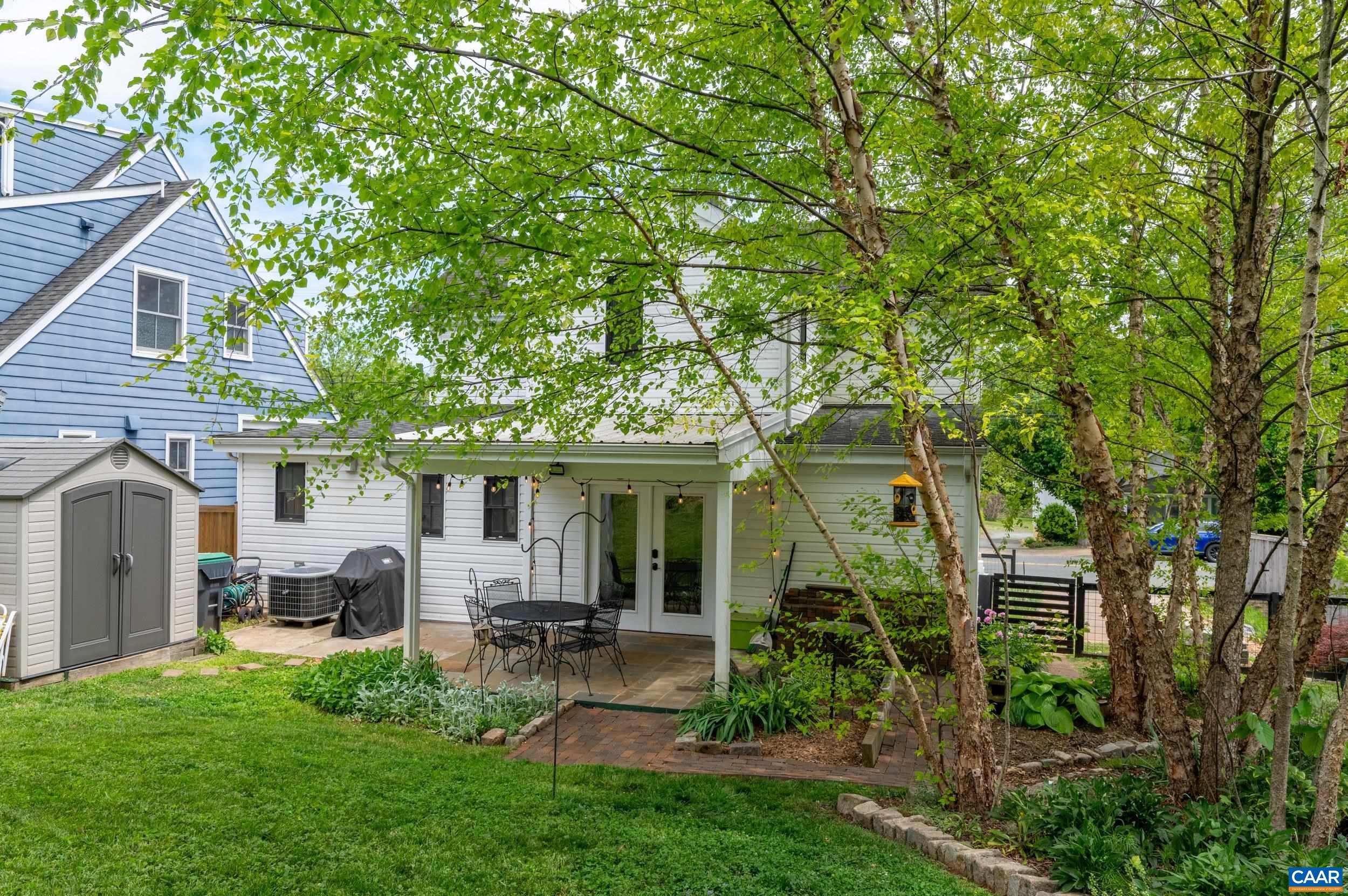 423 Meade Avenue Charlottesville, VA 22902 - Photo 40 of 47 a view of a house with backyard sitting area and garden