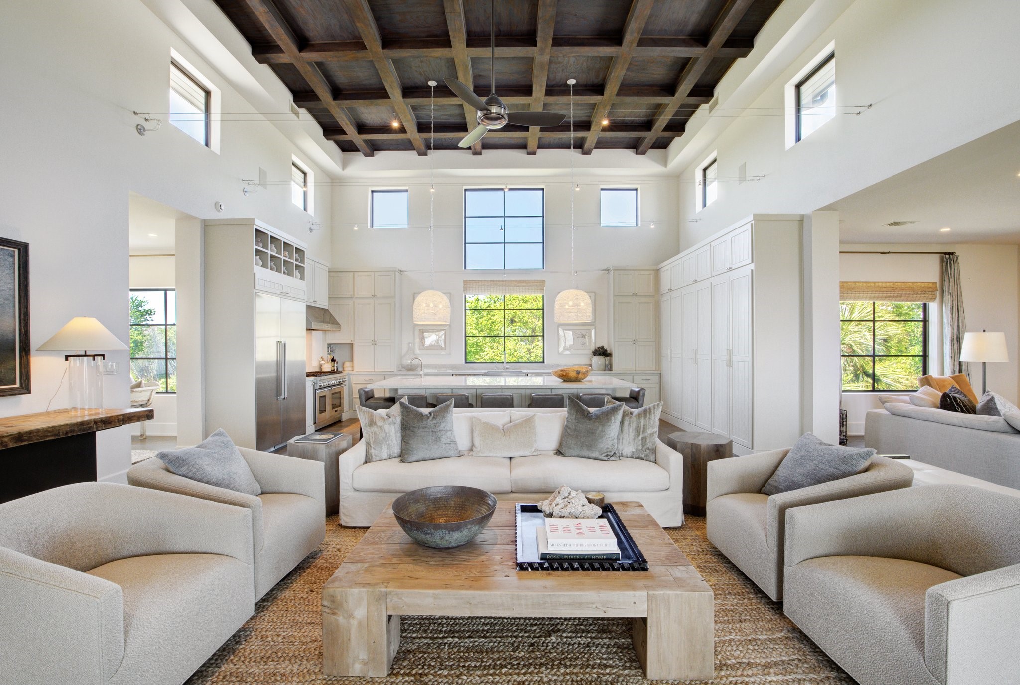 633 Quintana Roo Place Seabrook, TX 77586 - Photo 10 of 47 Elegant and inviting, this home showcases soaring coffered ceilings and abundant natural lighting with unmatched views from every window!
