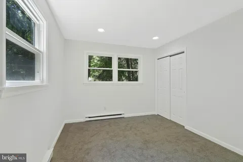 an empty room with windows
