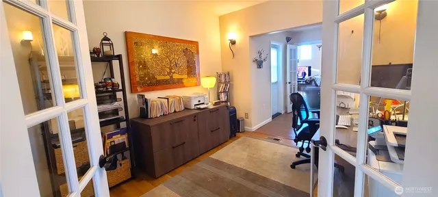 a workspace with furniture and a window