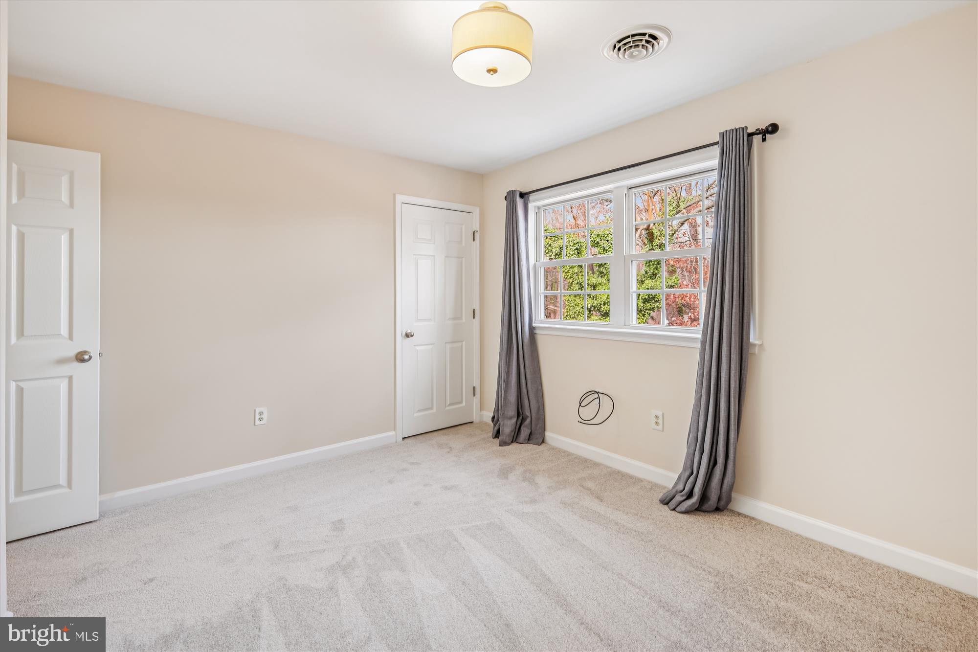 209 Webb Lane St. Michaels, MD 21663 - Photo 20 of 33 an empty room with windows