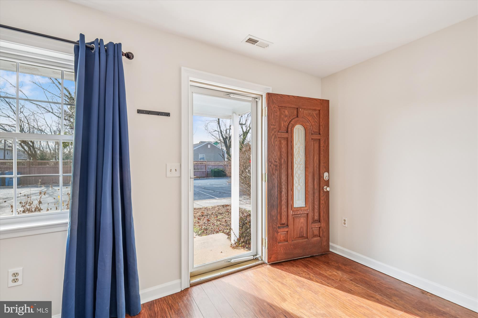 209 Webb Lane St. Michaels, MD 21663 - Photo 4 of 33 a view of an entryway with wooden floor