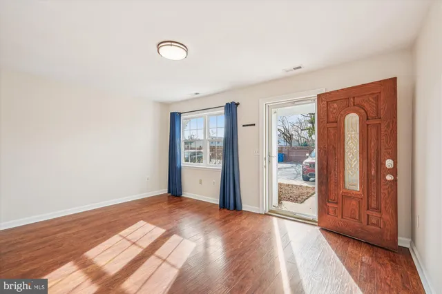 a view of an empty room and window