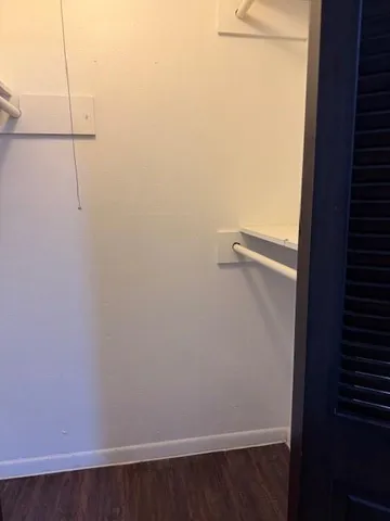 a view of small space with racks on the wall