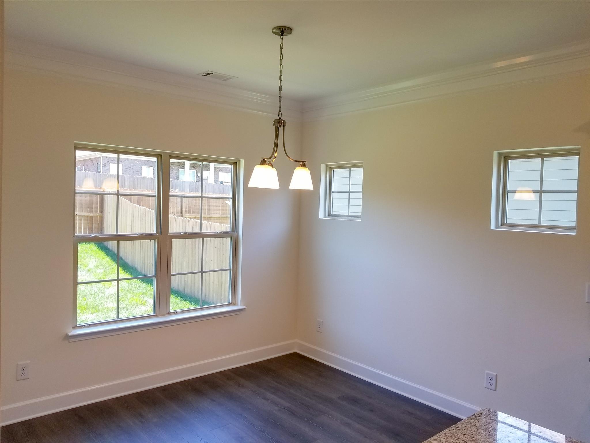 403 Butler Road Mount Juliet, TN 37122 - Photo 6 of 24 a view of a room with wooden floor and windows