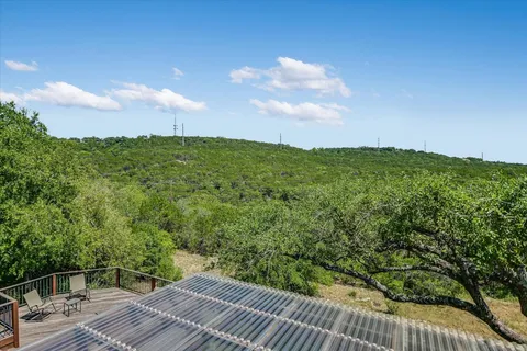 a view of a balcony with an outdoor space