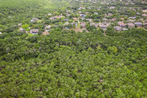 a front view of a house with a large window