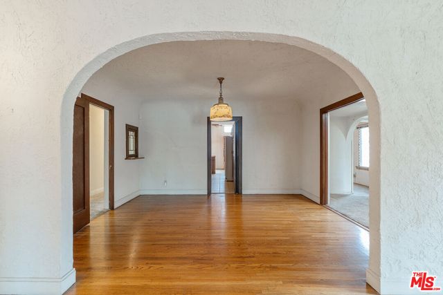 a view of a room with a hallway