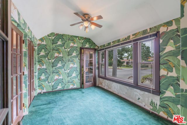 a view of an entryway with a garden