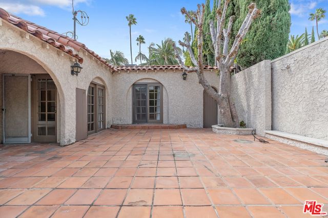 a aerial view of multiple houses with yard