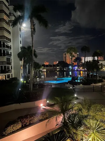 a view of a swimming pool and outdoor space