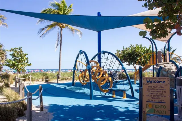 a view of a street with a building in the background