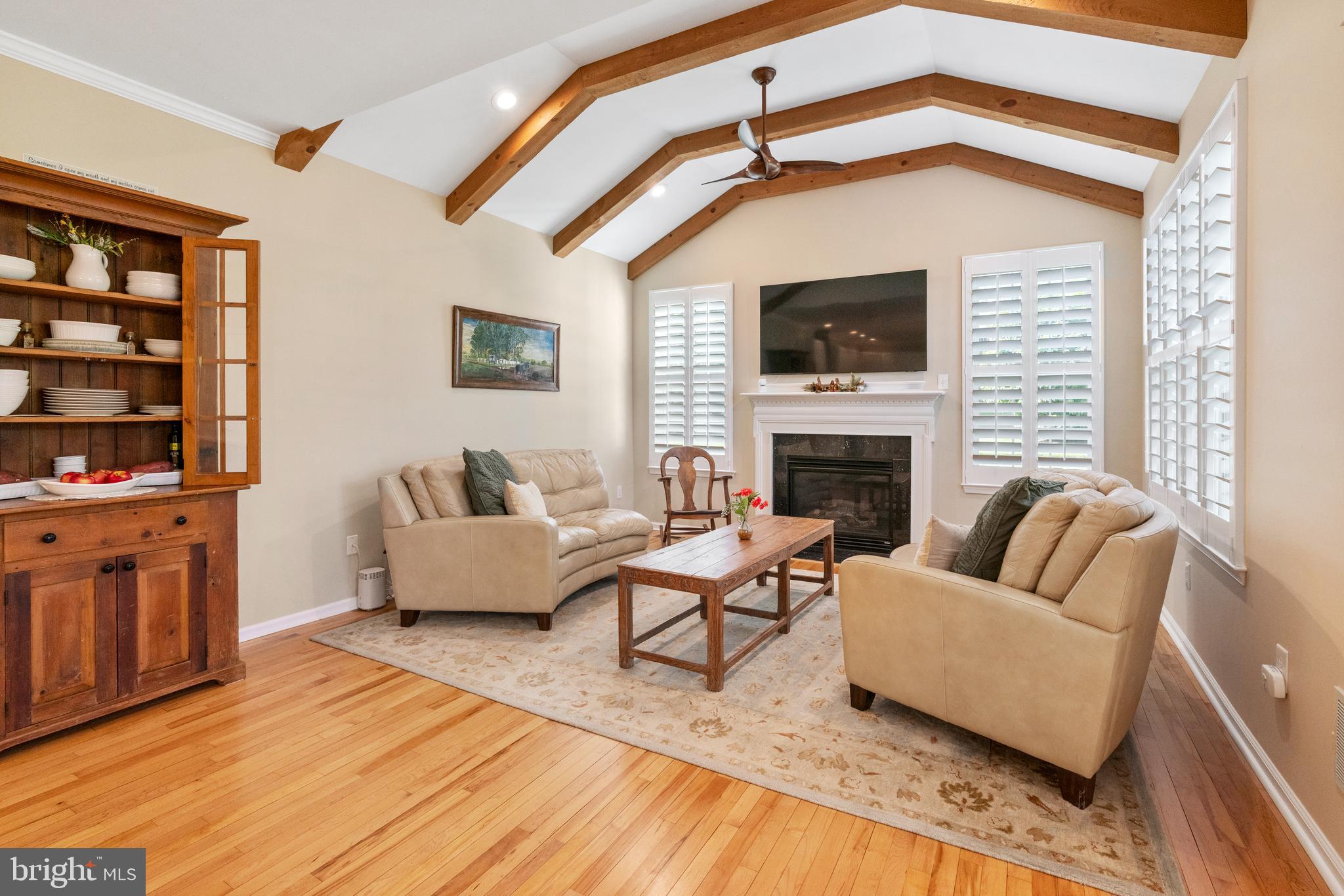 285 Cherry Lane Kennett Square, PA 19348 - Photo 13 of 38 a living room with furniture fireplace and flat screen tv