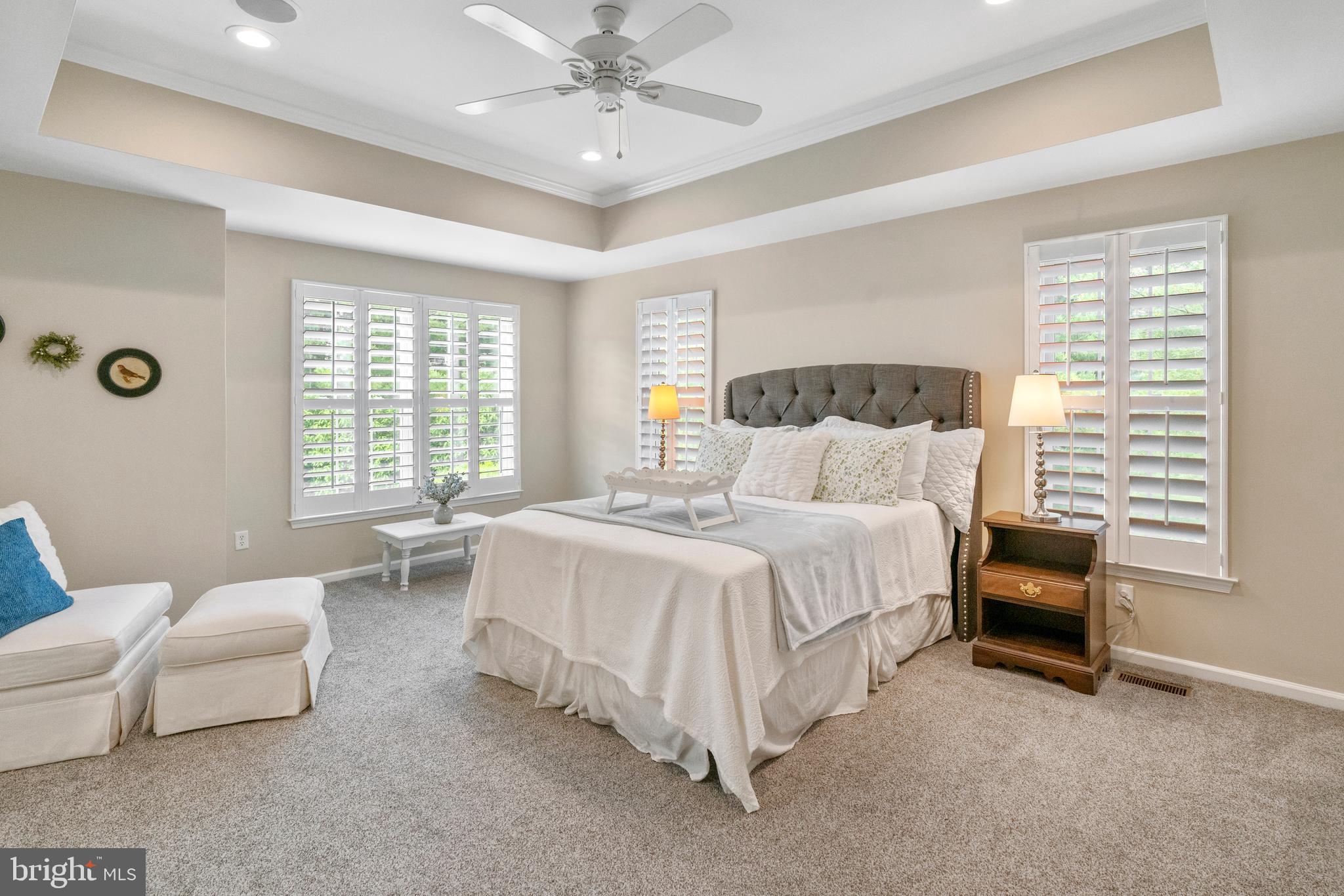 285 Cherry Lane Kennett Square, PA 19348 - Photo 27 of 38 a spacious bedroom with a bed and a couch
