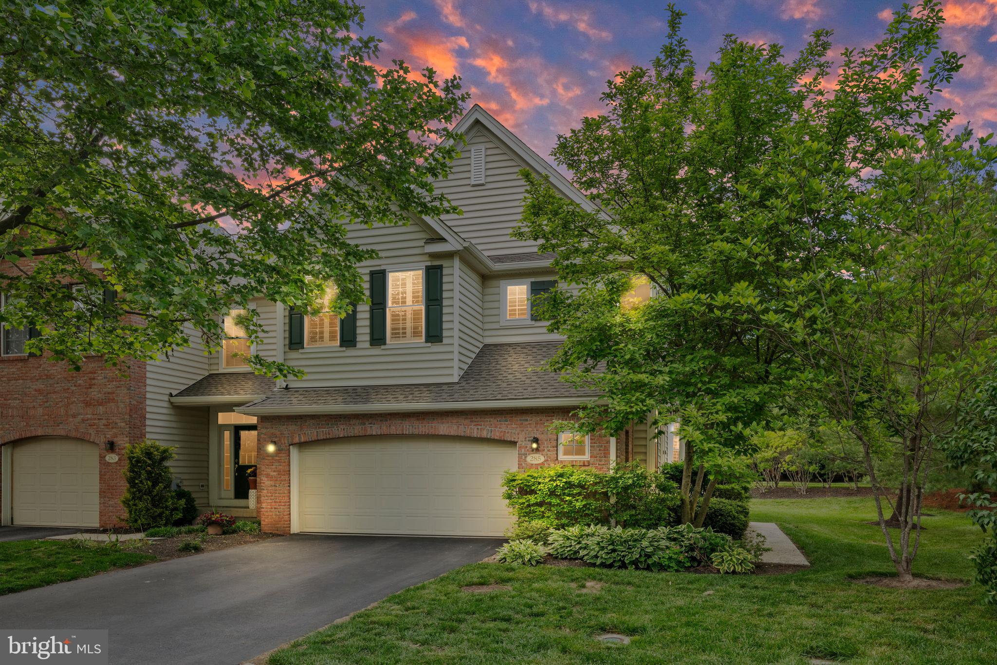 285 Cherry Lane Kennett Square, PA 19348 - Photo 3 of 38 a view of a yard in front of a house with a large tree