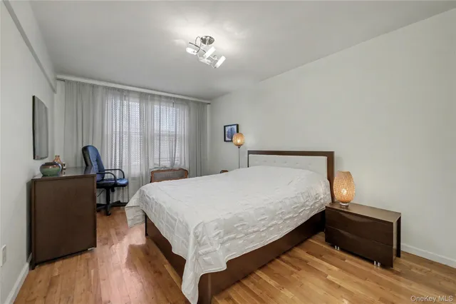 a bed room with a bed and a furniture