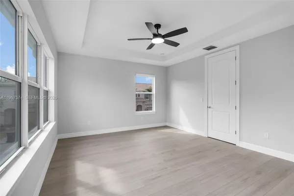 a view of an empty room with a window