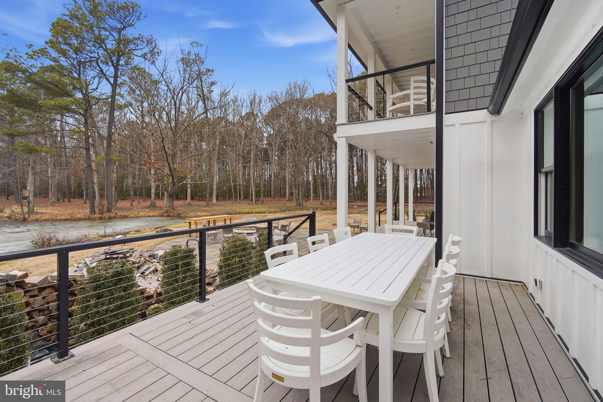9180 St Michaels St. Michaels, MD 21663 - Photo 58 of 65 the porch overlooks the pond and woods
