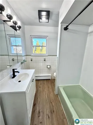 a bathroom with a sink and a toilet