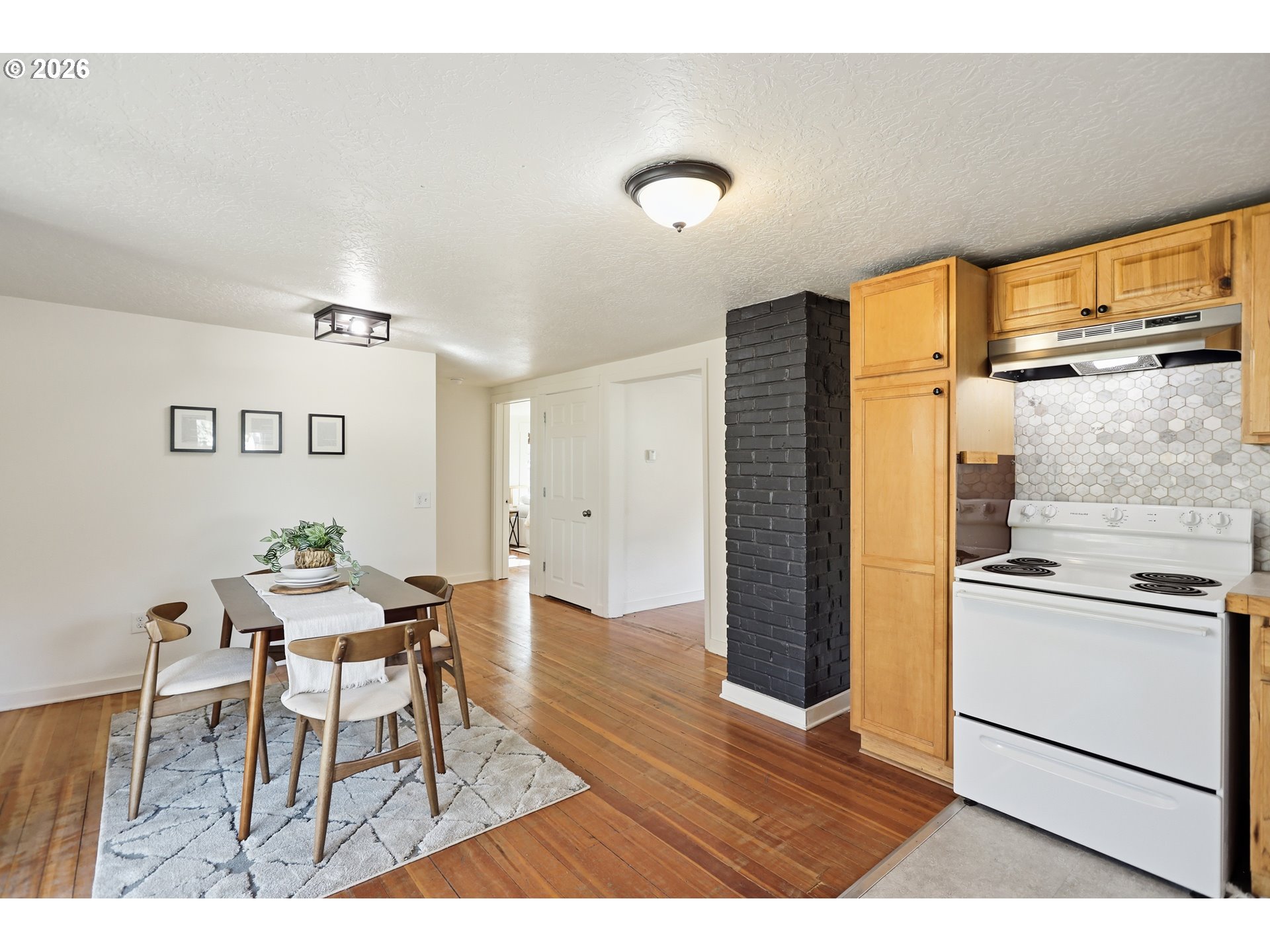180 Northwest Spring Street White Salmon, WA 98672 - Photo 17 of 44 a kitchen with a table and chairs