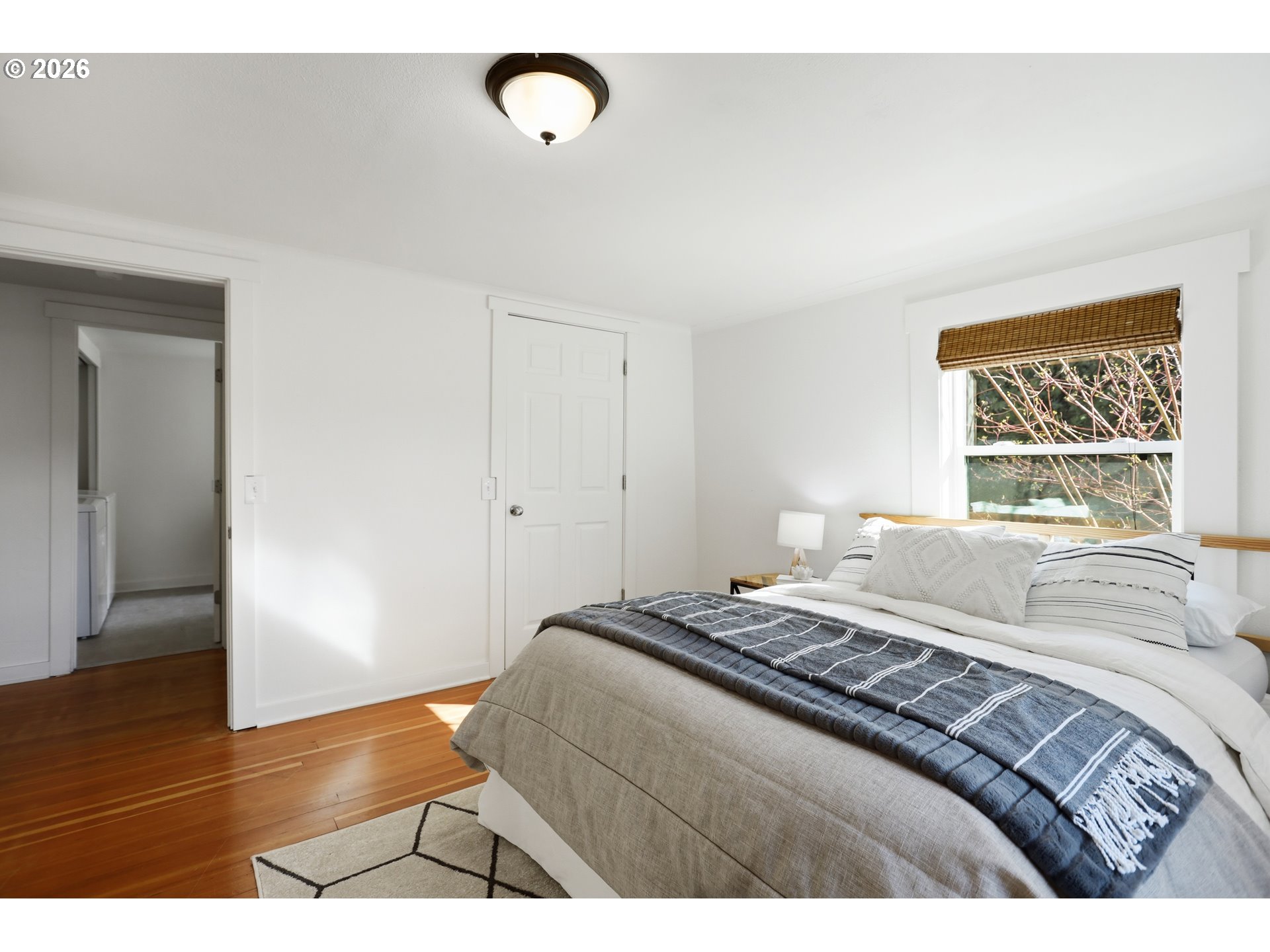 180 Northwest Spring Street White Salmon, WA 98672 - Photo 21 of 44 a bedroom with a bed and a window