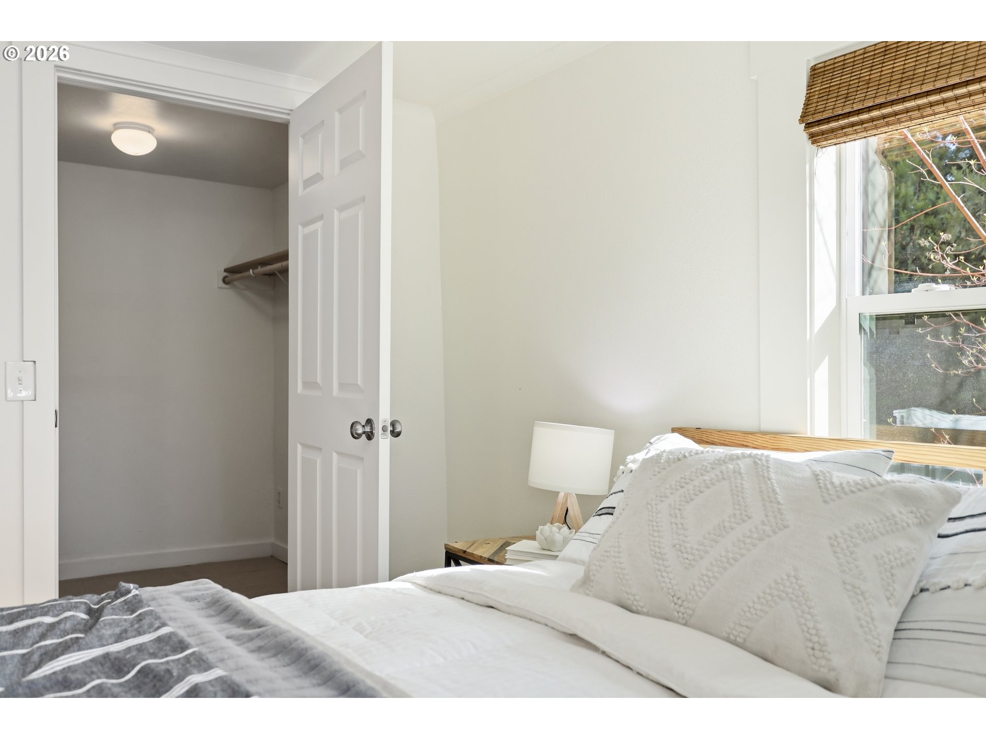 180 Northwest Spring Street White Salmon, WA 98672 - Photo 22 of 44 a bedroom with a bed and a window