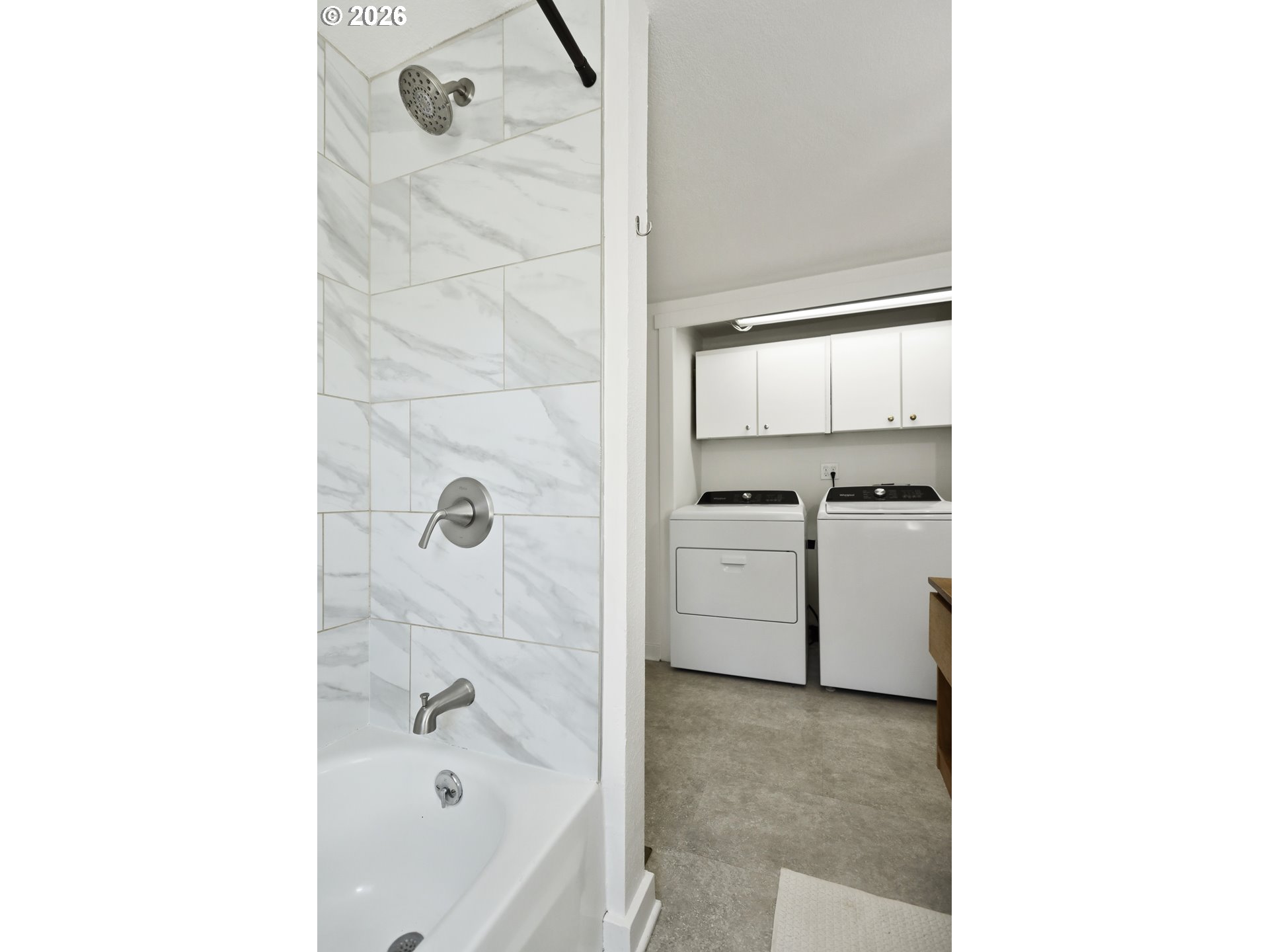 180 Northwest Spring Street White Salmon, WA 98672 - Photo 26 of 44 a bathroom with a bathtub and a shower