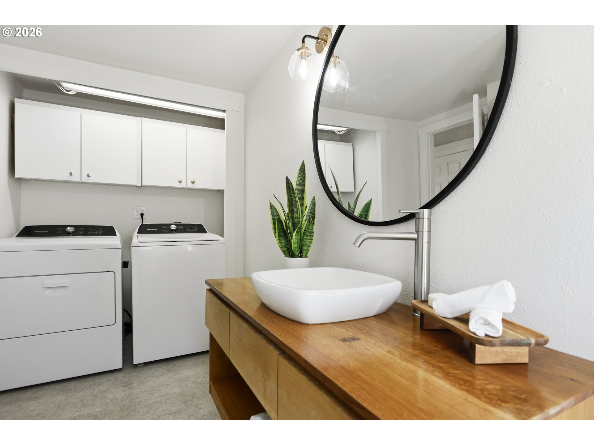 180 Northwest Spring Street White Salmon, WA 98672 - Photo 27 of 44 a bathroom with a sink a mirror and a vanity