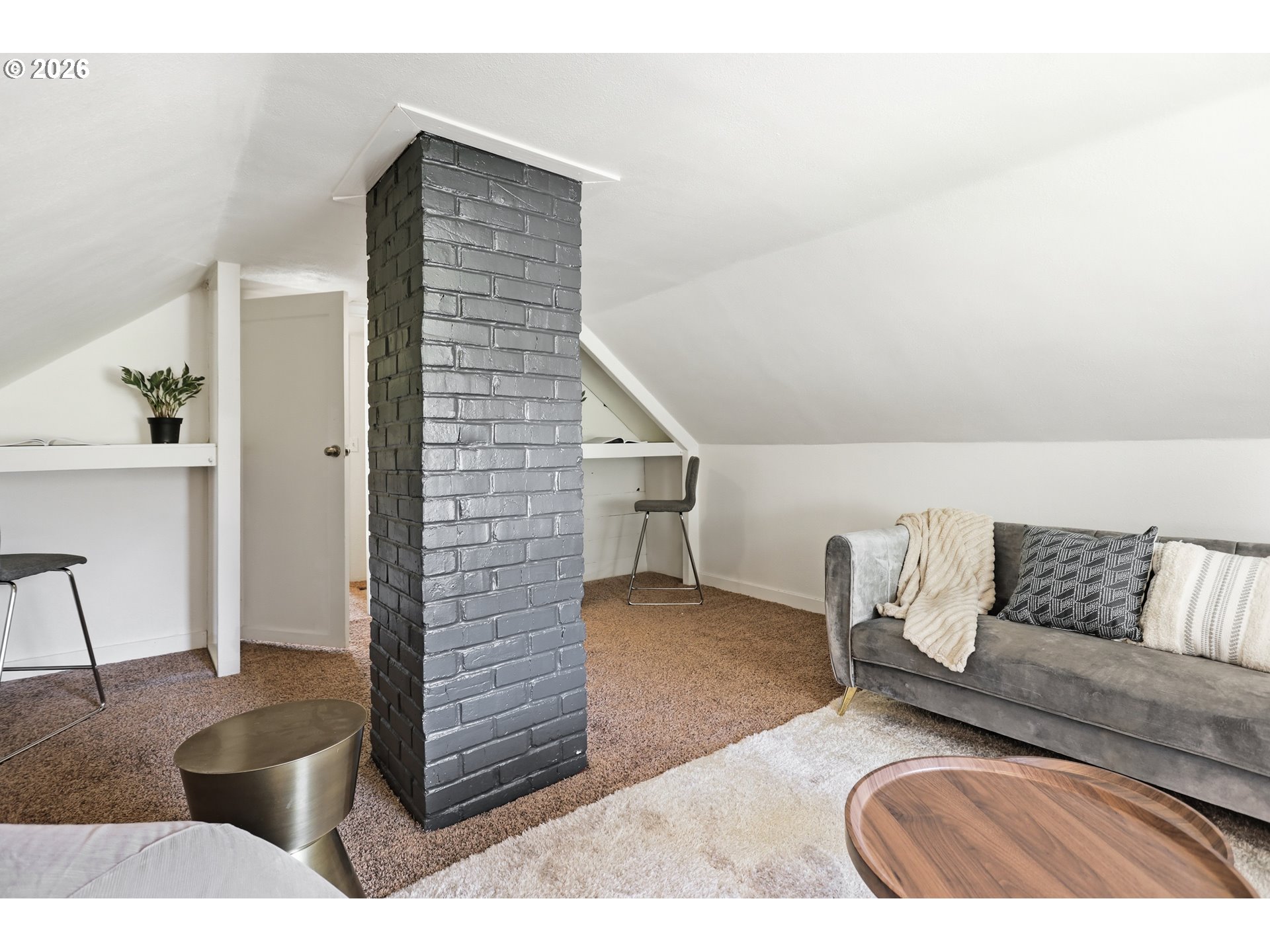 180 Northwest Spring Street White Salmon, WA 98672 - Photo 32 of 44 a living room with furniture and a couch