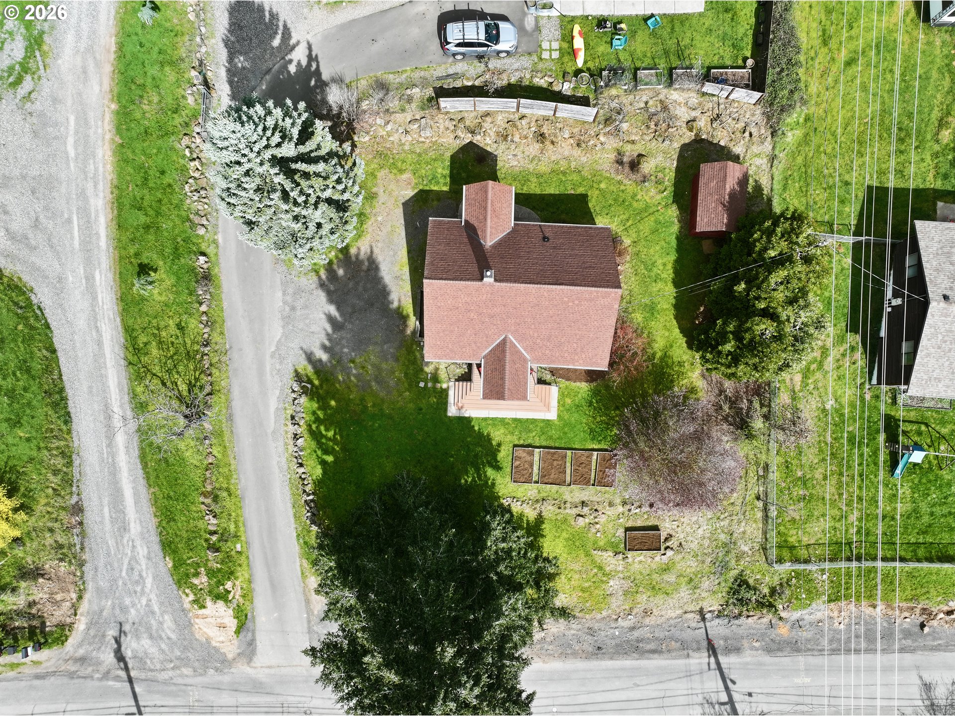 180 Northwest Spring Street White Salmon, WA 98672 - Photo 38 of 44 an aerial view of a house with a garden