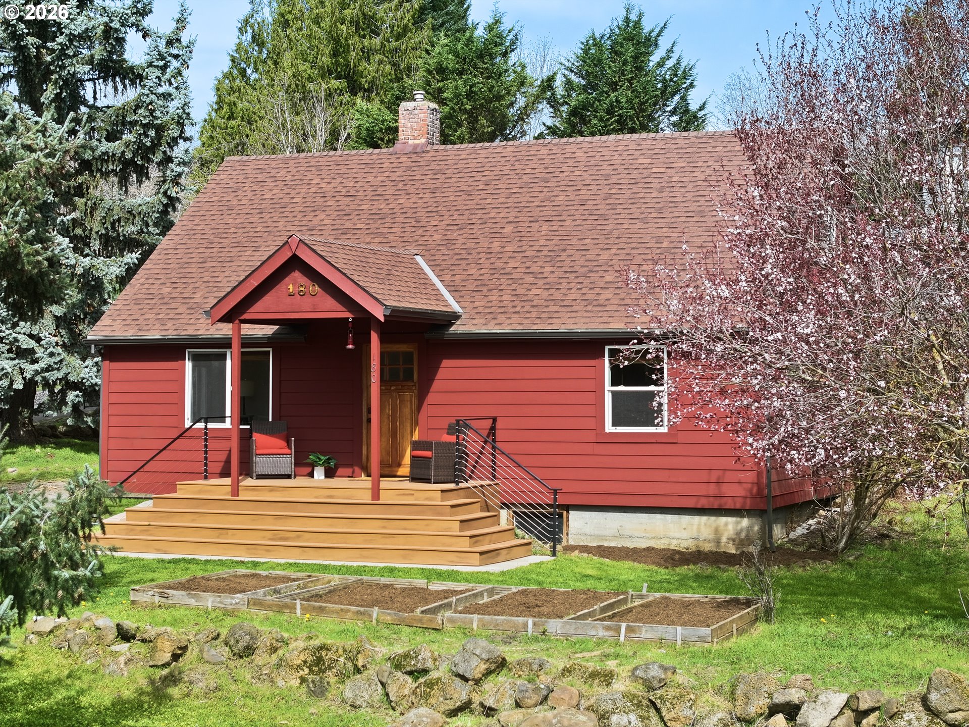 180 Northwest Spring Street White Salmon, WA 98672 - Photo 43 of 44 a front view of a house with a yard