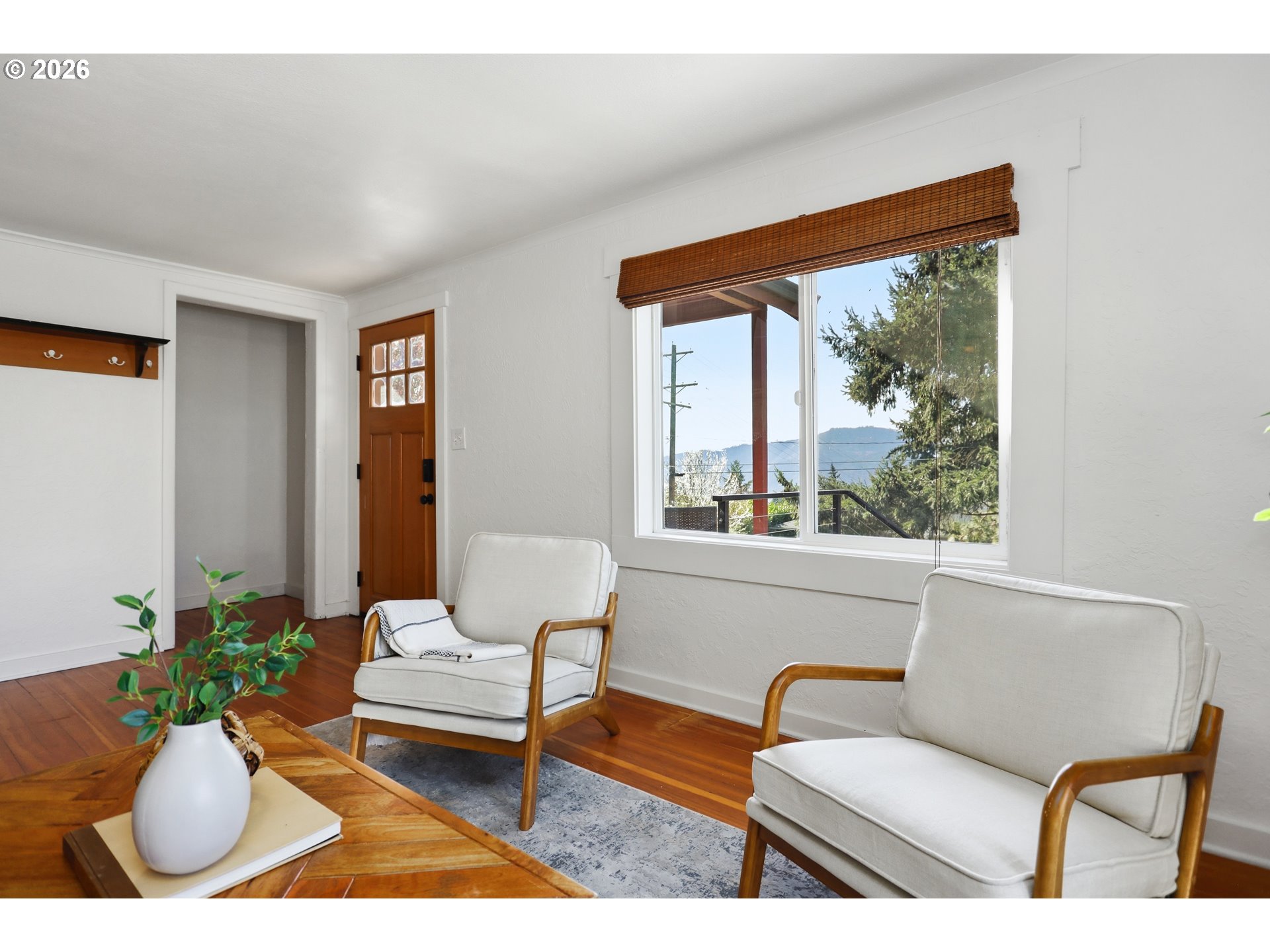 180 Northwest Spring Street White Salmon, WA 98672 - Photo 6 of 44 a living room with furniture and a large window