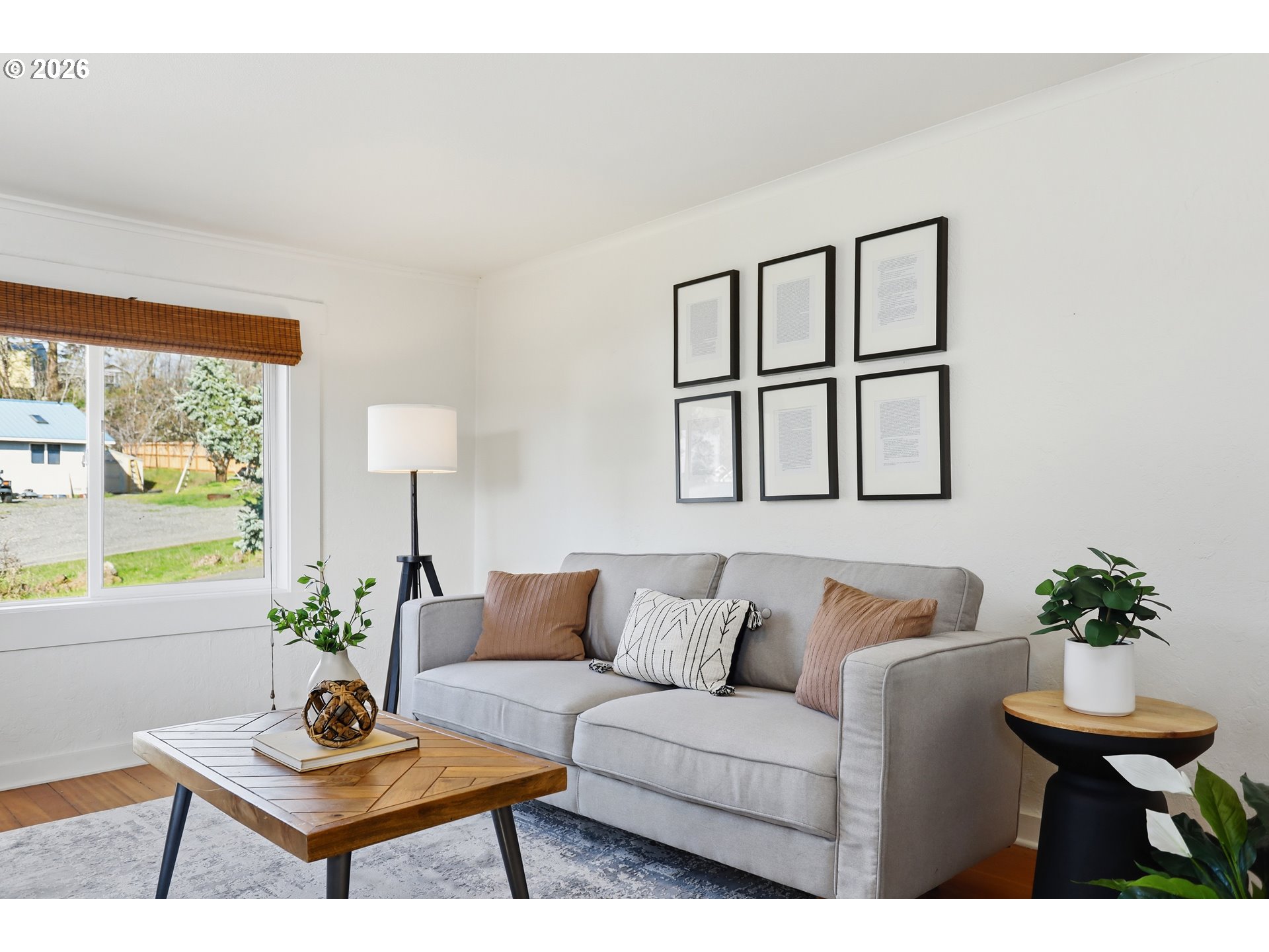 180 Northwest Spring Street White Salmon, WA 98672 - Photo 9 of 44 a living room with furniture a window and a potted plant