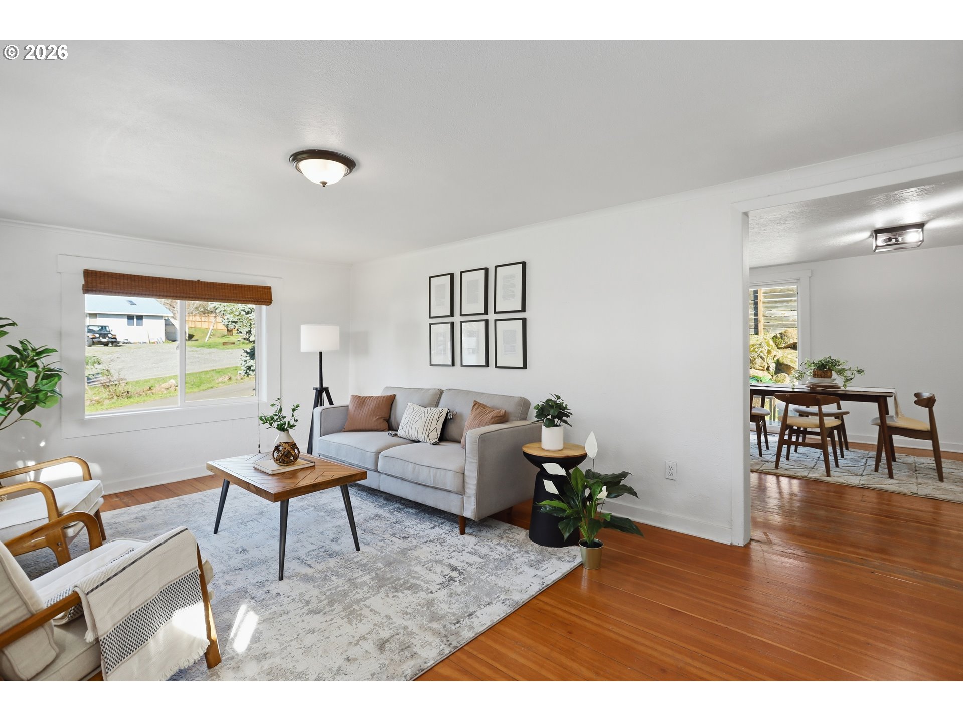 180 Northwest Spring Street White Salmon, WA 98672 - Photo 10 of 44 a living room with furniture and a wooden floor