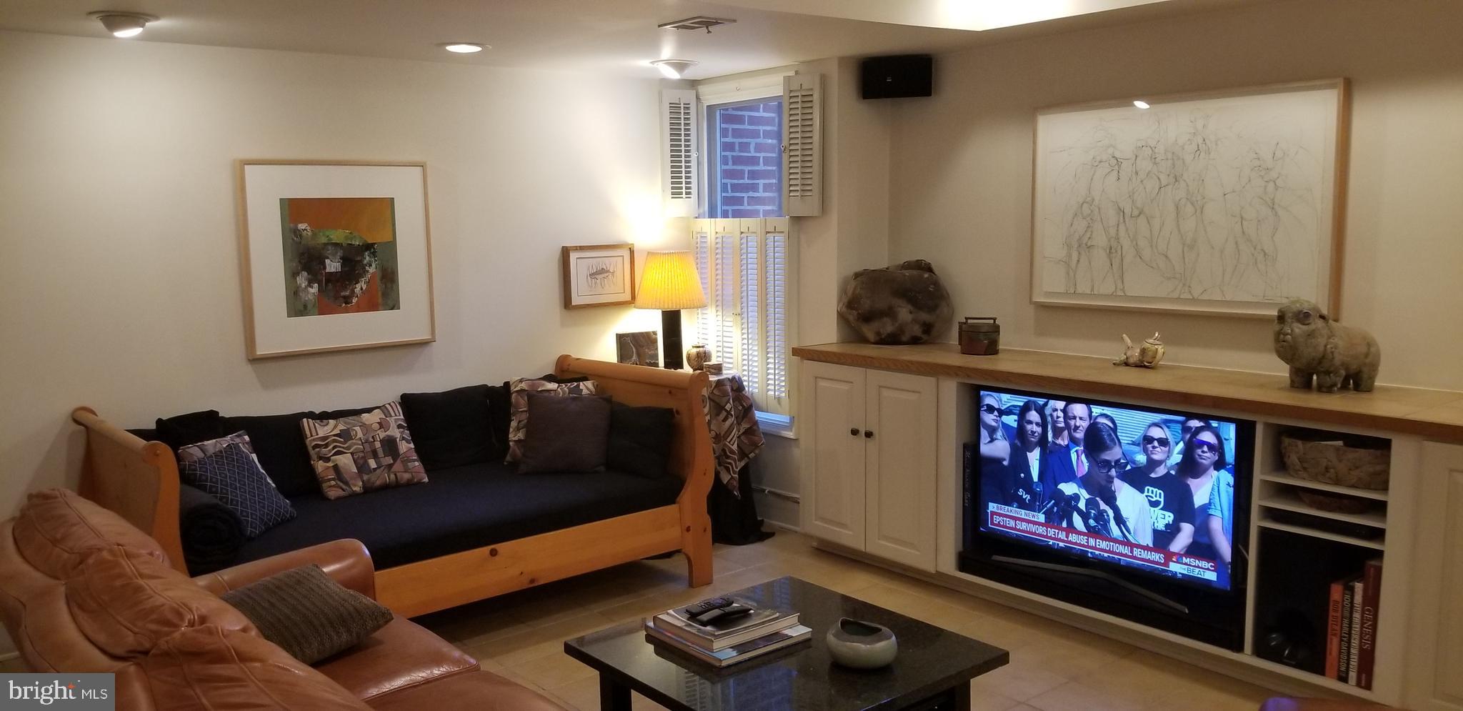 430 South 5th Street Philadelphia, PA 19147 - Photo 15 of 32 a living room with furniture and a flat screen tv