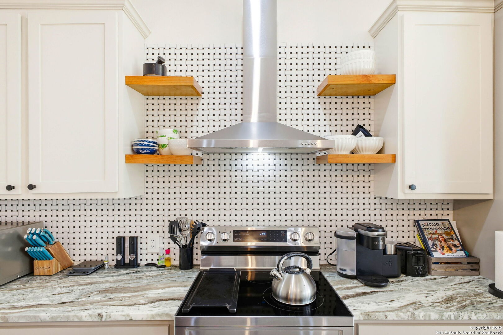 418 Tawny Oak Circle Bandera, TX 78003 - Photo 13 of 33 a kitchen with a sink and a window