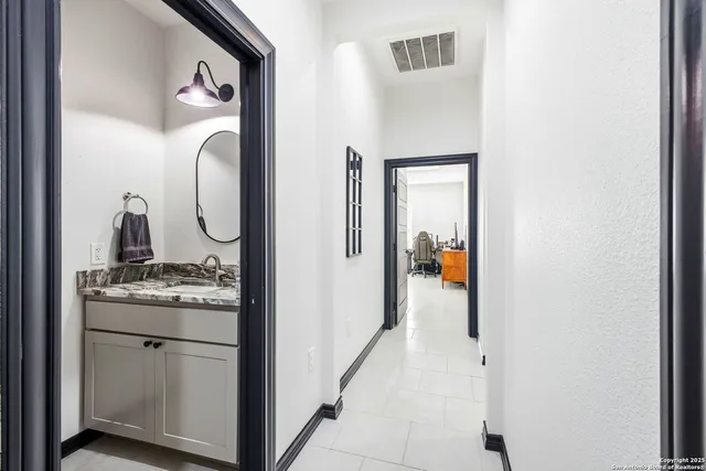 a bedroom with bed and a window