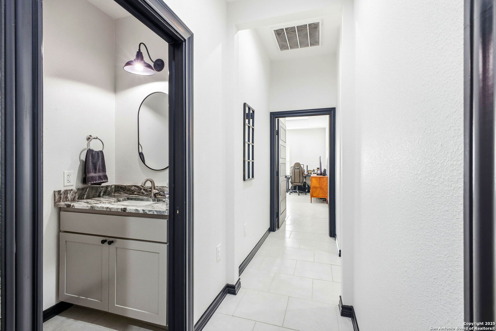 418 Tawny Oak Circle Bandera, TX 78003 - Photo 20 of 33 a view of a kitchen from a hallway