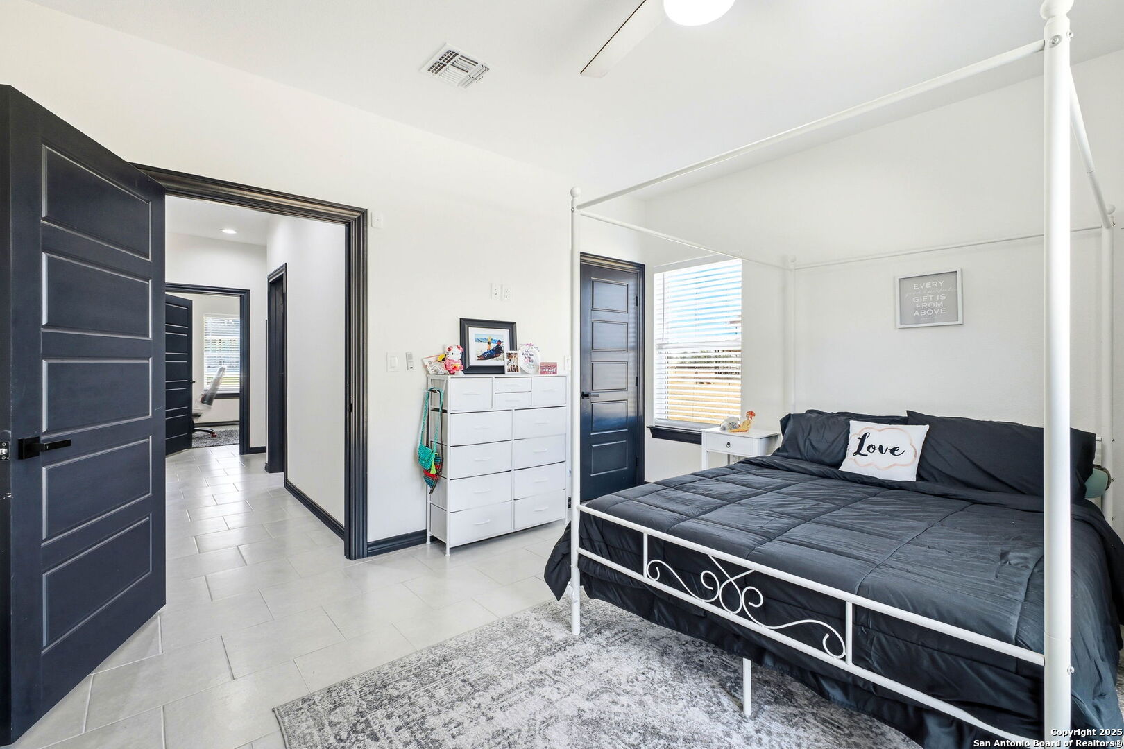 418 Tawny Oak Circle Bandera, TX 78003 - Photo 24 of 33 a living room with a bed and furniture
