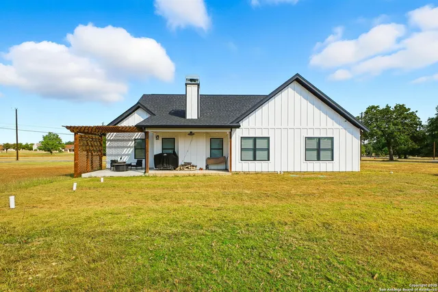 a view of a house with a ocean view