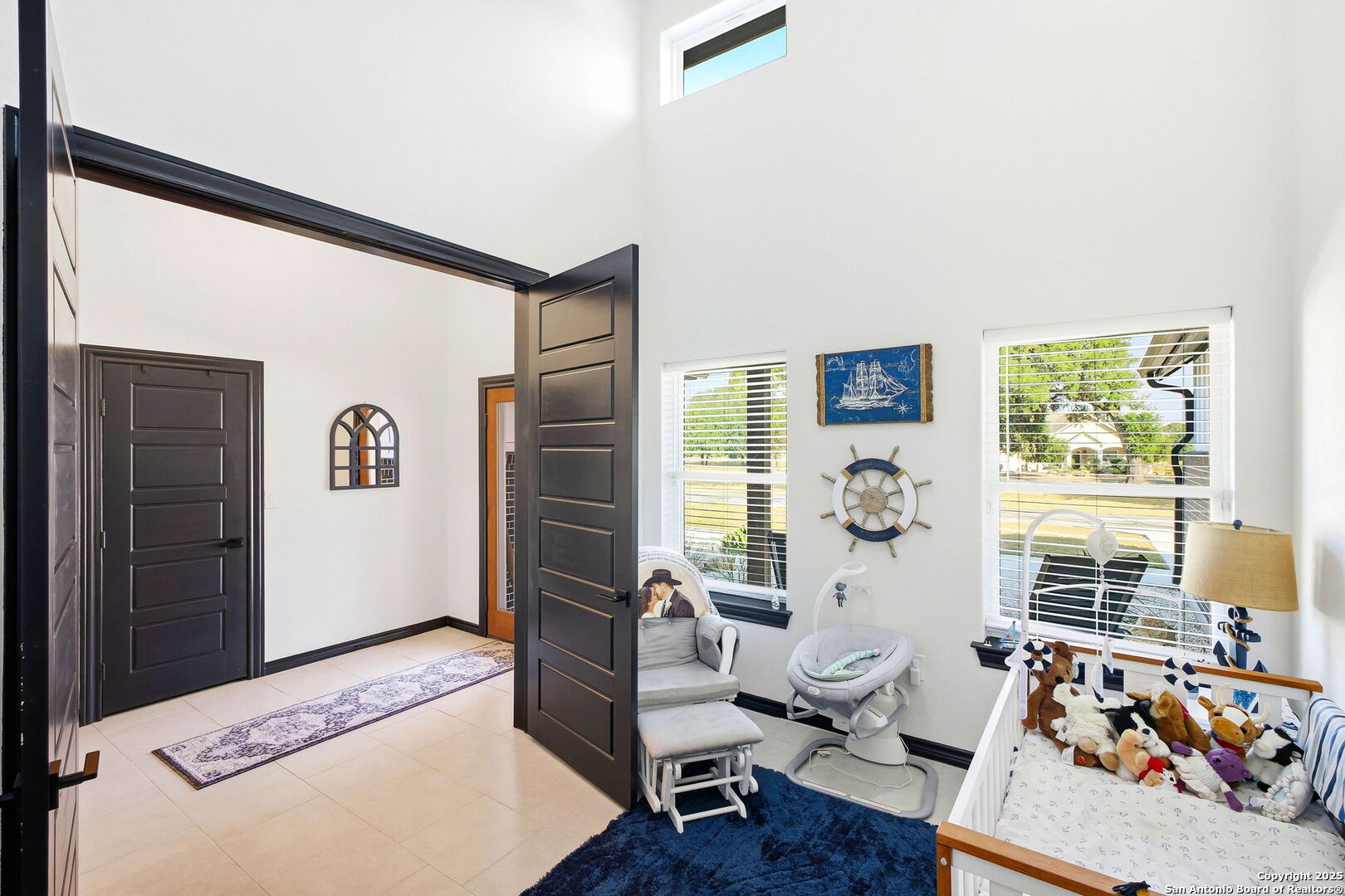 418 Tawny Oak Circle Bandera, TX 78003 - Photo 5 of 33 a bedroom with furniture and a window