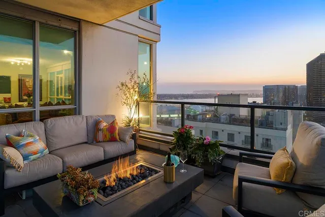 a outdoor living space with furniture and a potted plant