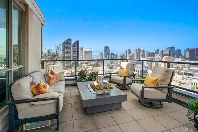a terrace with outdoor seating and a couch