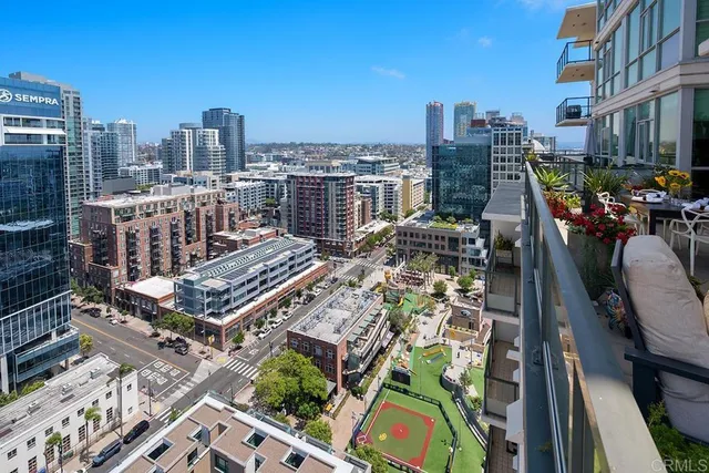 a view of a city with tall buildings